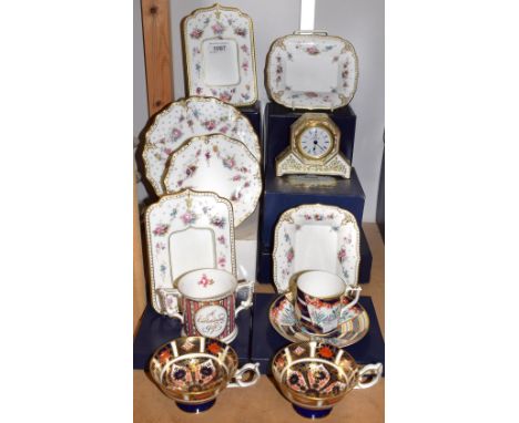 A Royal Crown Derby Royal Antoinette pattern photo frame, boxed; another; other plates and trinket dishes; a pair of 1128 tea