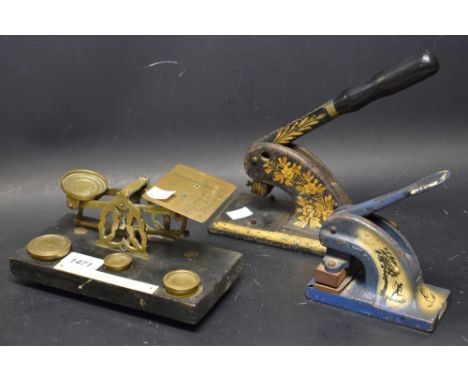 A set of late Victorian brass postal scales; two nymph desk presses