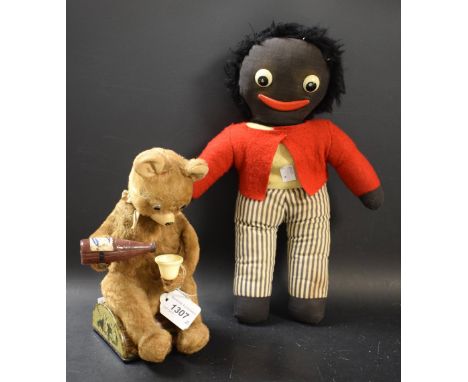 A Golliwog by Pedigree; battery operated drinking bear tin plate automaton (2)