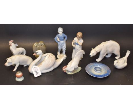 A Royal Copenhagen model of a Polar Bear; others, pig, swan, owls, other birds; little girl figure; qty