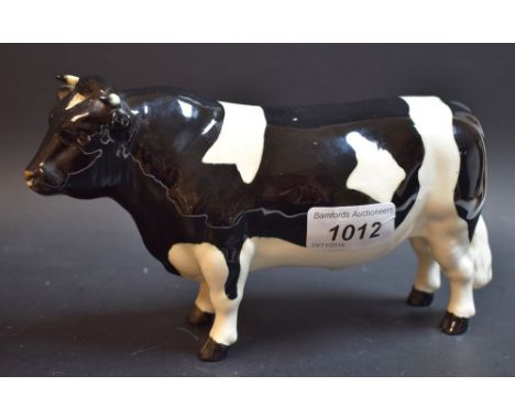 A Beswick Friesian bull, CH Coddington Hilt Bar, modelled by Arthur Gredington, 12cm high, printed mark, model no.1439B