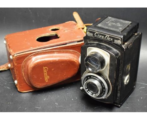 A Ciro-Flex twin lens camera, made in the USA, Alphax lens, brown leather case