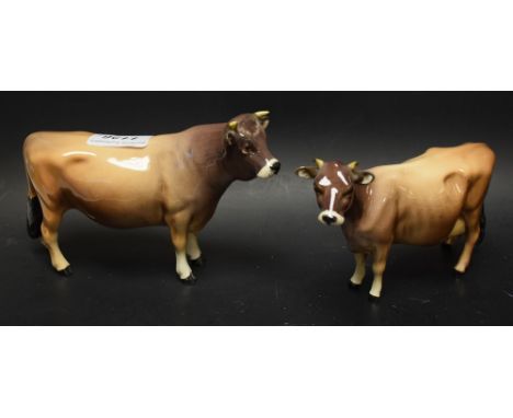 A Beswick Jersey bull, CH Dunsley Coy Boy, designed by Arthur Gredington, 12cm high, printed mark model no.1422; a similar co