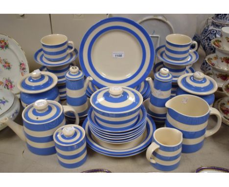A TG Green blue banded Cornish ware dinner and tea service, including cups and saucers, storage jars, oil and vinegar jugs, d