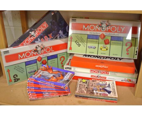 Eight boxed 'Monopoly' game, some sealed, Russian, English, German, editions, collection of modern 'Spiderman' magazines; qua