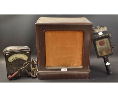 A Universal avometer; a carriage lamp; a bakelite speaker (3)