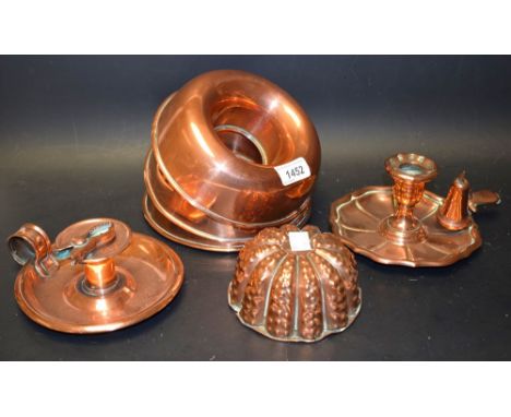 Kitchenalia - a trio of copper military issue cake rings, stamped NS and Co Ltd, arrow, 129 - 1454 - 1967; another sea urchin