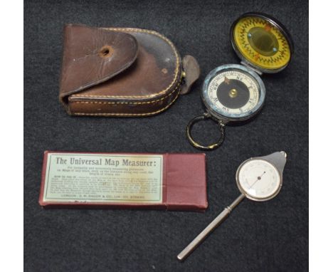 A leather cased Magnapole military compass; a universal map measure