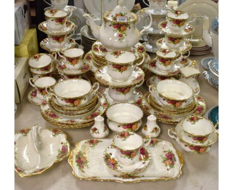 A Royal Albert Old Country Roses dinner and tea service, cups saucers, assorted plates, soup dishes, teapot, milk and sugar; 