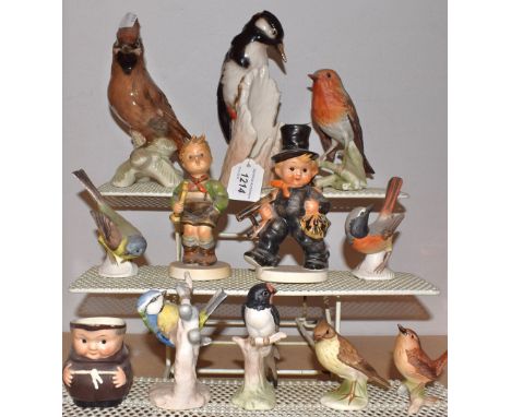 A Goebel model of a woodpecker; others, waxwing, blue tit, robin; other figures, little boy; qty