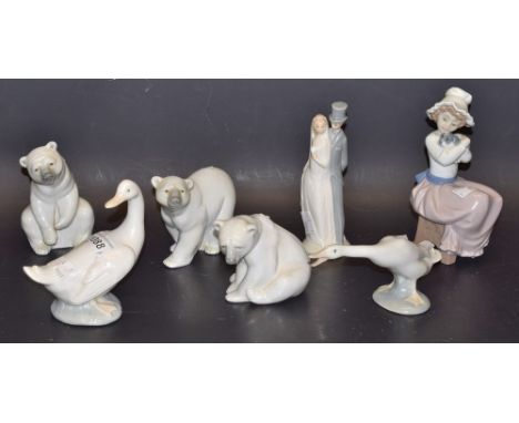 Ceramics - four Lladro figures, three bears, one swan, three Nao figures, Bridal couple, girl with puppy, one goose