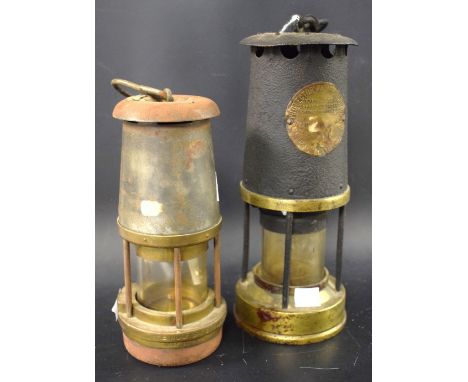 A 20th century miner's lamp; another similar, smaller (2)