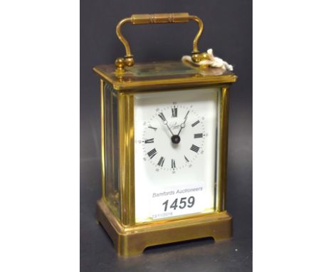 A 20th century French lacquered brass carriage timepiece, by L'Epée of Paris, retailed by Poyser, 5.8cm white enamel dial ins