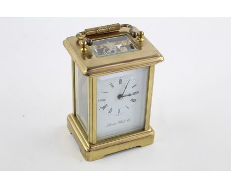 London clock Co. heavy brass carriage clock key-wind working order no warranty given dimensions -11.5cm(h) x 8cm(w) key inclu
