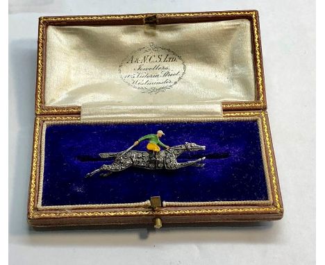 Fine diamond and enamel gold on silver jockey brooch 