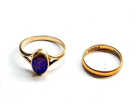 18ct gold wedding ring with 9ct gold stone set ring .22ct weight 2.4g  9ct ring weight 2.4g