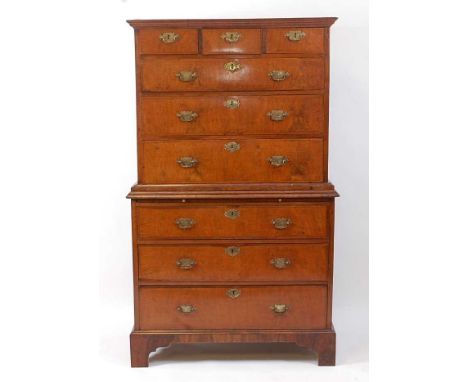 A mid-18th century walnut chest-on-chest, the upper section having three short and three long graduated drawers, the base fit