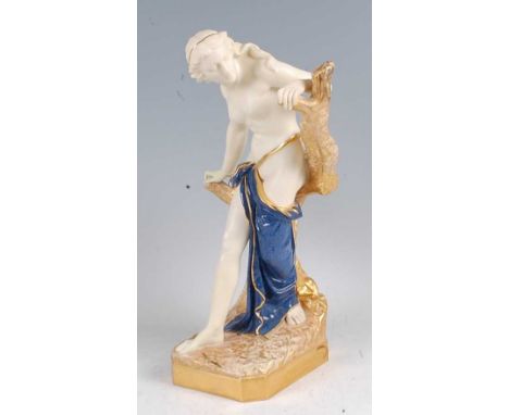 A Royal Worcester porcelain figure 'Bather Surprised', modelled by Sir Thomas Brock as a semi-cladmaiden against a treestump,