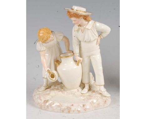 A Royal Worcester porcelain group, modelled as a boy and girl with pitchers, designed by James Hadley, the whole heightened i