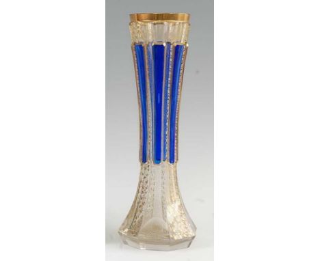 A Bohemian glass  vase by Moser, circa 1900, with vermicelli gilding and royal blue panels, h.32cm