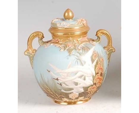 A Royal Worcester porcelain pot pourri vase and cover, of baluster form, shot enamel decorated with swans by Johnson on a pow