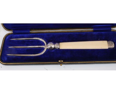 A cased late Victorian silver and ivorine handled toasting fork, maker A&amp;D, Sheffield 1897, 22.5cm, housed in a velvet an