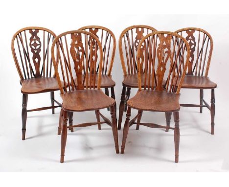 A set of four Victorian elm seat, ash and fruitwood stickback farmhouse kitchen chairs; together with two other similar examp