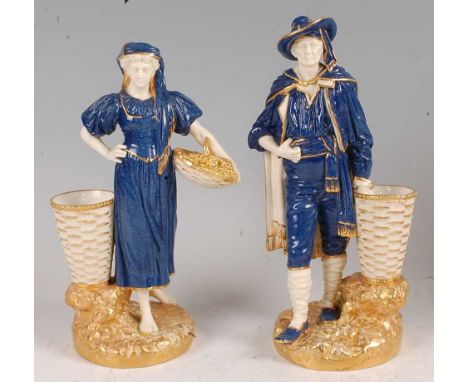 A pair of Worcester porcelain figures of grape-pickers, modelled by James Hadley, each in standing pose, her holding a basket
