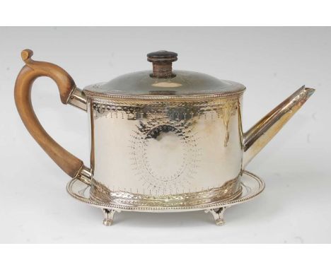 A George III silver teapot on stand, of beaded oval form, both with bright cut engraved decoration, the teapot with finial to