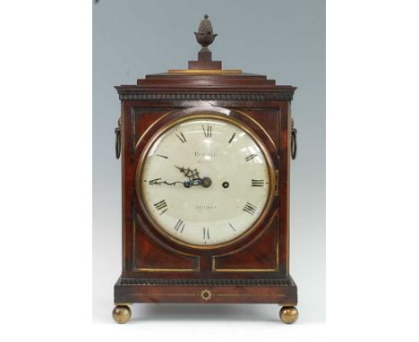 Russell of The Barbican, London, - a Regency mahogany and brass inlaid bracket clock, the stepped pediment with gilt metal pi