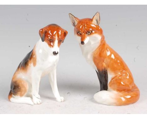 A Royal Worcester porcelain fox, model No.2993, black backstamp, h.18.5cm; together with a Royal Worcester porcelain beagle, 