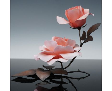 Exquisite Boehm bone china sculpture titled Queen Elizabeth Rose, crafted with delicate hand-painted petals in soft shades of