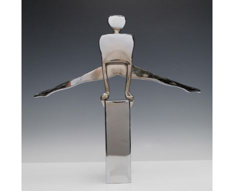 Impressive Dolbi Casher chrome acrobat sculpture featuring a gymnast captured in mid-motion, crafted from high-polished chrom