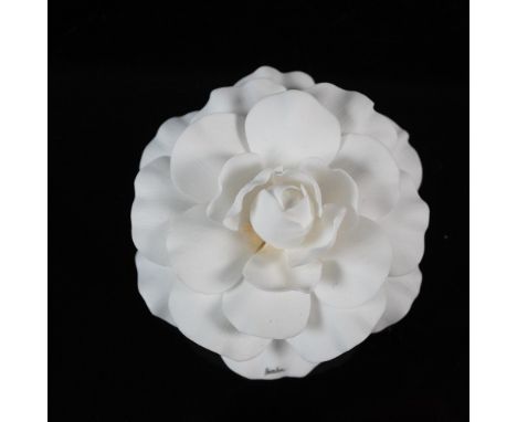 Delicately sculpted white porcelain camellia brooch by Boehm, known for their exquisite botanical porcelain creations. This p