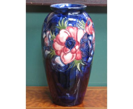 MOORCROFT TUBE LINED CLEMATIS PATTERN CERAMIC VASE. INITIALED W.M. APPROXIMATELY 26CM HIGH 