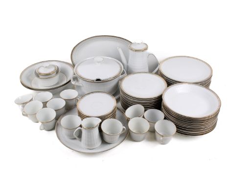 A Winterling Bavarian dinner and coffee service. Glazed in white with textured details and gilt rims, including cups and sauc