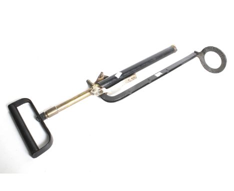 A 1965 British Army Dron-Wal stirrup pump. Marked '3/1965' and with arrow to shaft. Closed height 70.5cm.