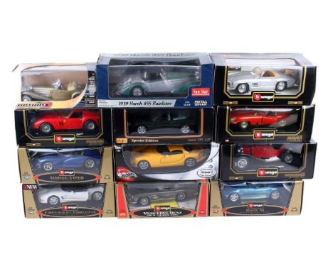 An assortment of boxed die-cast model vehicles. Including Burago Jaguar 'e' Cabriolet (1961), Porsche 911 Carrera Cabriolet, 