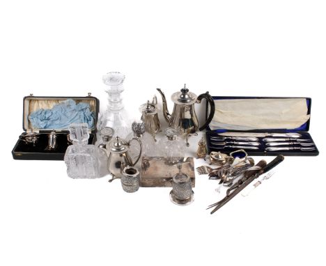 An assortment of silver and silver plate. Including perfume bottles, flatware, a pepper grinder, etc.