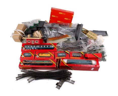 An assortment of Hornby 00 gauge carriages and accessories. Including a boxed Inter-City Buffet Car, R.923, 'Birds Eye' Close