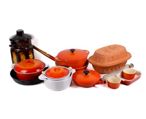 A collection of mostly orange enamel cookware. Noting some Le Creuset, a ceramic pot, etc. Max. H32cm