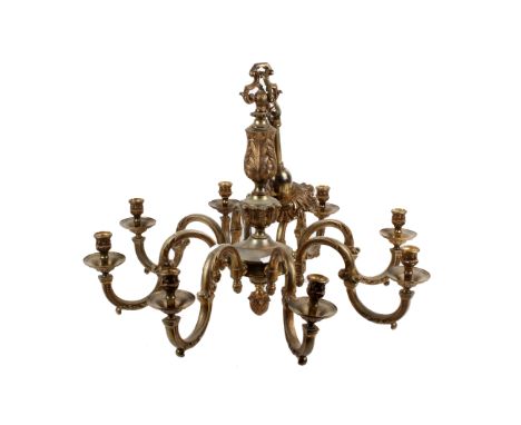 A gilt metal eight-branch chandelier. With pineapple finial decoration. Diameter 68cm