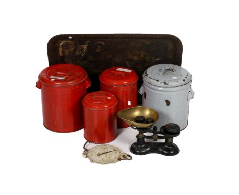 An assortment of metal kitchenalia. Including a set of enamel storage bins, a set of balance scales with weights and a large 