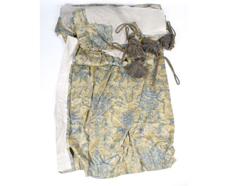 Two pairs of full length pleated and lined curtains. On a yellow ground with classical swags, birds and figures. Length 245cm