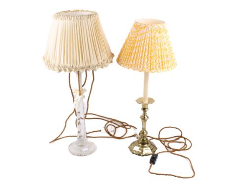 Two table lamps. Comprising a brass example modelled as a candlestick and a glass example. Max. H31cm