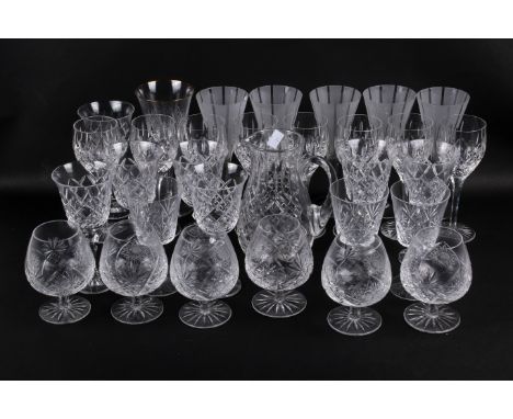 A large collection of cut glass drinking glasses. Including brandy, wine and some champagne flutes. Max. H20cm