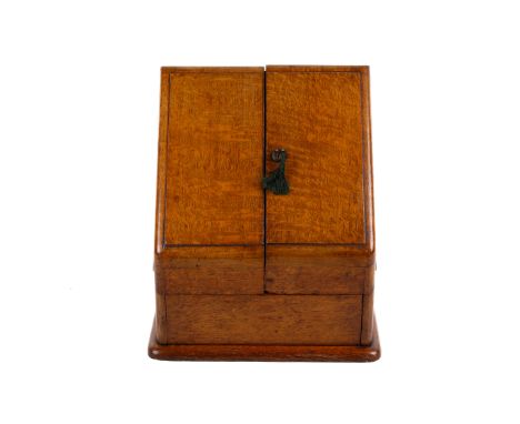 An early 20th century mahogany writing box. Containing letter racks, a pen tray, inkwell and a sliding tray, H33cm