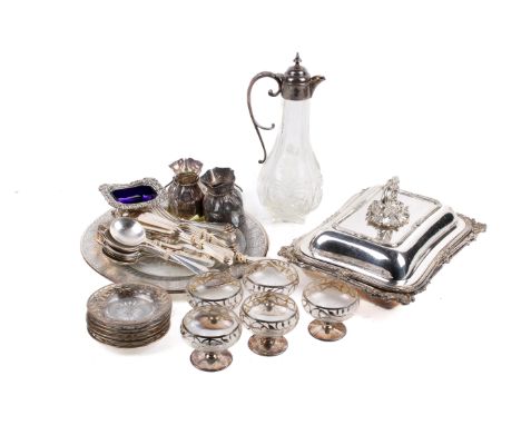 A collection of assorted silver plated items. Including cutlery, a table salt with blue glass liner, flatware, etc.