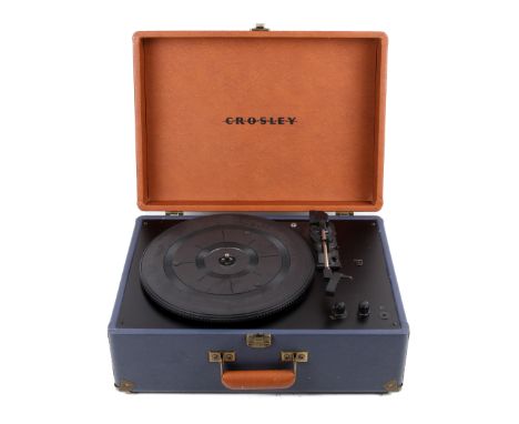 A mid-century Crosley record player. In an orange and blue leatherette case, L44cm***This lot is being sold on behalf of Free