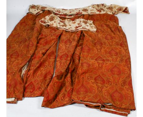 Two pairs of red brocade full length curtains. Having a gilt design, lined, L226cm x W115cm (hem)
